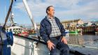 Leslie Garvan  on board one of his two fishing boats in  Kilkeel harbor in Northern Ireland. Photograph: James Forde for The Irish Times