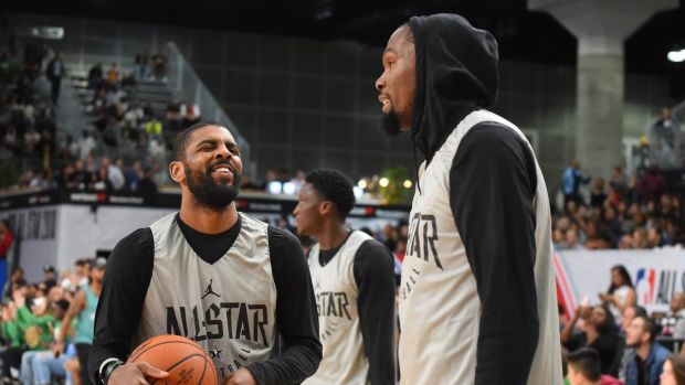 Kyrie Irving is unlikely to play much with new Brooklyn Nets team-mate Kevin Durant this season due to Durant’s long-term injury. Photograph: Jayne Kamin-Oncea/Getty Images