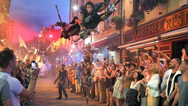 An acrobatic stilt-walker is seen in Galway city during the city’s arts festival. File photograph: Joe O’Shaughnessy