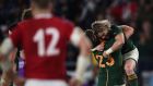 South Africa’s centre Frans Steyn and scrumhalf Faf de Klerk celebrate their side’s win over Wales. Photograph: Charly Triballeau/AFP/Getty
