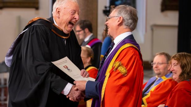 Tom Boyle receives his degree from Professor Willie Donnelly, president of WIT. Photograph: Patrick Browne