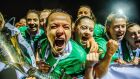 Peamount United’s Áine  O’Gorman celebrates with the league trophy after beating Cork City. Photograph: Oisin Keniry/Inpho