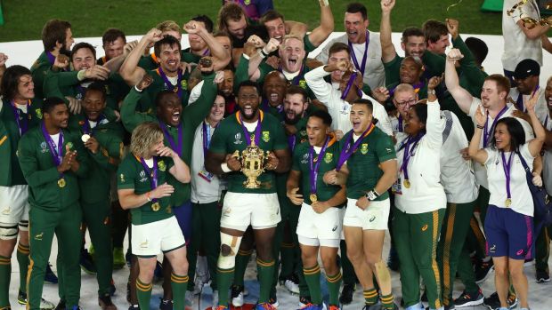 South Africa celebrate their Rugby World Cup final win over England. Photograph: Michael Steele/Getty
