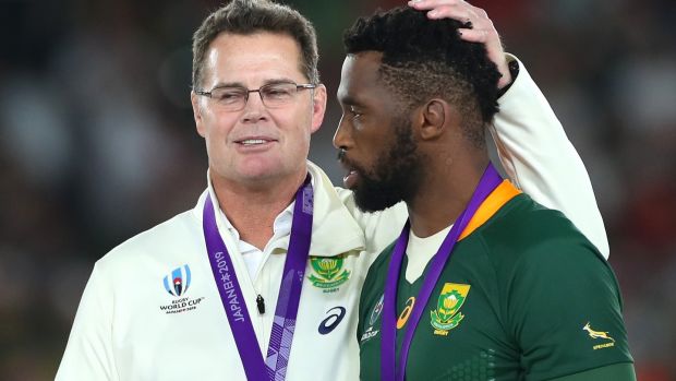 Rassie Erasmus with his captain Siya Kolisi after South Africa’s Rugby World Cup final win over England. Photograph: Cameron Spencer/Getty