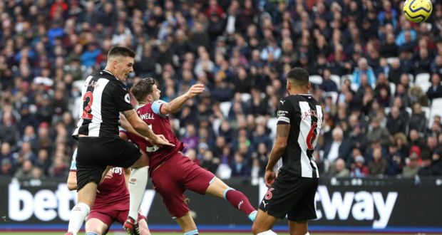  Ciaran Clark heads in a goal for Newcastle United against West Ham United at London Stadium. Photograph: Alex Pantling/Getty Images