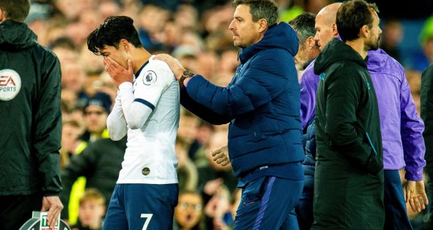  Tottenham Hotspur’s Son Heung-min  reacts after tackling Everton’s Andre Gomes causing an injury to the Everton player during the  Premier League  match  at  Goodison Park. Photograph:  Peter Powell/EPA