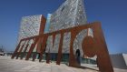 A giant steel name plate marks the entrance to the Titanic Belfast Experience in Northern Ireland.  Photograph: Peter Macdiarmid/Getty Images