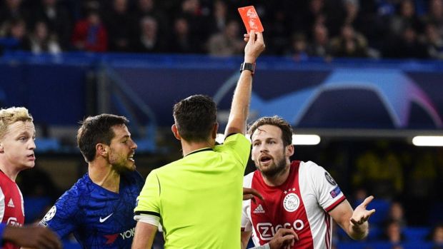Ajax’s Daley Blind is sent off against Chelsea. Photograph: Neil Hall/EPA