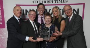 The Irish Times managing director Liam Kavanagh presenting the award for Overall Innovation of the year to Atlantic Therapeutics’ Brendan McCormack, Danny Forde, Dr Ruth Maher, Christina Walsh and Richard Allen. Photo: Conor McCabe 