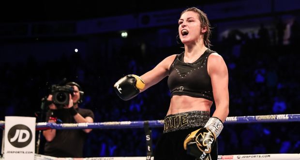 Katie Taylor celebrates her victory over Christina Linardatou after the super-lightweight championship fight at the  Manchester Arena. Photograph: Gary Carr/Inpho