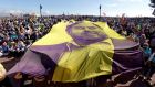 Supporters with a banner of jailed former Catalonian regional government deputy president Oriol Junqueras. Photograph: Susanna Saez/EPA