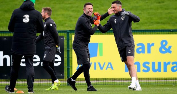 Republic of Ireland assistant manager Robbie Keane with  Troy Parrott at training for the game against New Zealand. Photograph: Ryan Byrne/Inpho