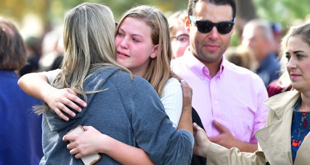  Students and parents embrace after being picked up at Central Park, after a shooting at Saugus High School in Santa Clarita, California on Thursday. Photograph: Frederic J Brown/AFP