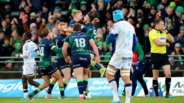 Connacht players celebrate at the final whistle after securing a famous win in Galway. Photograph: James Crombie/Inpho