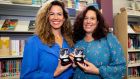 Sarah Lynott and Cathleen Lynott , daughters of Phil Lynott with new coin. Photograoh: Tom Honan