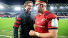 Munster senior coach Stephen Larkham with Billy Holland: In recruiting Graham Rowntree and Stephen Larkham, Munster have brought in fresh creative thinking and vast experience into their organisation. Photograph: Gary Carr/Inpho  