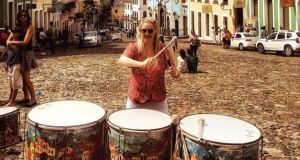 Emma Cahill playing the drumms in Salvador, Brazil. 