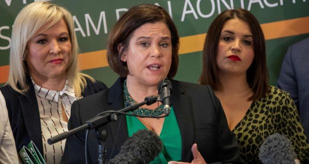 Sinn Fein President Mary Lou McDonald (C) flanked by Northern leader Michelle O’Neill (L) and party candidates speaks at their manifesto launch in Derry on Monday. Photograph: Paul Faith/AFP 