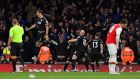 Brighton celebrate Neal Maupay’s late winner at the Emirates. Photograph: Ben Stansall/AFP/Getty