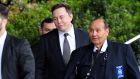 Tesla CEO Elon Musk (centre)  arriving  at US district court in Los Angeles. Photograph: Mark J Terrill/AP