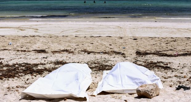 Recovered bodies on the beach of Aghir in Tunisia’s southern island of Djerba from a boat carrying 86 migrants that capsized off the Tunisian coast while crossing the Mediterranean from Libya to Italy in July. Photograph: Anis Mili/AFP via Getty Images