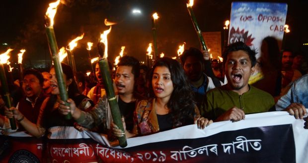 Students of Gauhati University take part in a torchlight procession against the Citizenship Amendment Bill   in Guwahati, Assam, India. Photograph: EPA