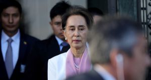 Myanmar’s leader Aung San Suu Kyi leaves the International Court of Justice in The Hague on Thursday. Photograph:  Eva Plevier/Reuters