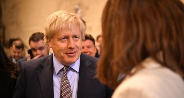 British prime minister Boris Johnson greets newly-elected Conservative MPs at the Houses of Parliament in London. The new MPs will be sworn in on Tuesday. Photograph: Leon Neal/Getty