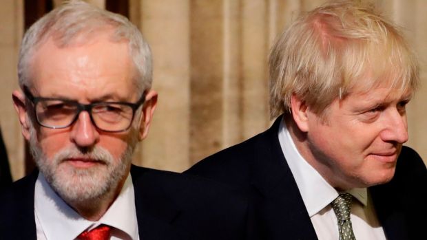 Labour Party leader Jeremy Corbyn and prime minister Boris Johnson walk through the Commons members’ lobby on Thursday. Photograph: Kirsty Wigglesworth/POOL/AFP via Getty Images