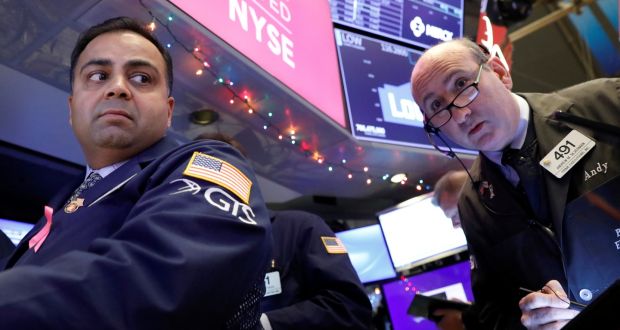 Traders work on the floor at the New York Stock Exchange: the S&P 500, which sets the tone for markets globally, passed a landmark in August as it recorded its longest rally, having gone nine and half years without a fall of at least 20 per cent. Photograph: Reuters