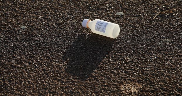 A discarded methadone bottle in  Dublin city centre. Photograph:  Nick Bradshaw 
