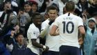 Tottenham’s Dele Alli celebrates with Serge Aurier and Harry Kane after scoring against Brighton & Hove Albion. Photograph: PA