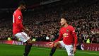 Manchester United’s Mason Greenwood celebrates with Marcus Rashford after scoring against Newcastle United at Old Trafford. Photograph: Getty Images