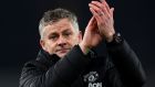  Ole Gunnar Solskjaer  applauds the travelling fans after the defeat to Arsenal. With Solskjær it’s not clear there is any attacking strategy  at all beyond trying to play in the quick lads up front as they run in behind. Photograph:  Clive Mason/Getty