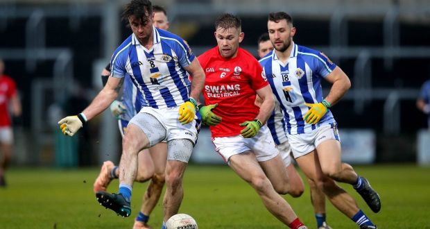   Michael Darragh Macauley of Ballyboden St Enda’s in action against  Mark Furey of Éire Óg during the hard-fought Leinster club football final at O’Moore Park. Photograph: Ryan Byrne/Inpho  