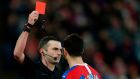Crystal Palace midfielder Luka Milivojevic receives a red card from referee Michael Oliver during the  FA Cup third-round  match against  Derby County at Selhurst Park. Photograph: Ian Kington/AFP via Getty Images