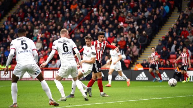 Sheffield United’s Callum Robinson scores during the FA Cup third-round game against AFC Fylde at Bramall Lane. Photograph: Tim Goode/PA Wire