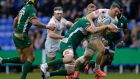  Sam Simmonds of Exeter Chiefs is tackled by Barney Maddison of London Irish during their  Premiership  match  at the Madejski Stadium  in Reading. Photograph:  Henry Browne/Getty Images
