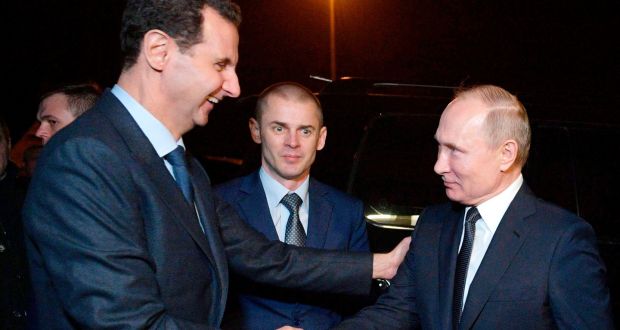 Russian president Vladimir Putin (right), with  Syrian president Bashar Assad  in Damascus, Syria,  on Tuesday. Photograph: Alexei Druzhinin/Sputnik/Kremlin Pool/AP