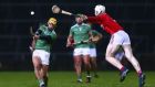 Limerick’s Tom Morrissey shoots under pressure from Cork’s Chris O’Leary. Photograph: Ken Sutton/Inpho