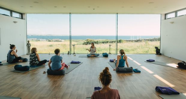 Michelle Moroney teaching a yoga class during her Cliffs of Moher retreat