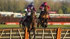 Aidan Coleman riding Paisley Park clear of the last to win The Ladbrokes Long Distance Hurdle at Newbury in November. Photograph:  Alan Crowhurst/Getty Images