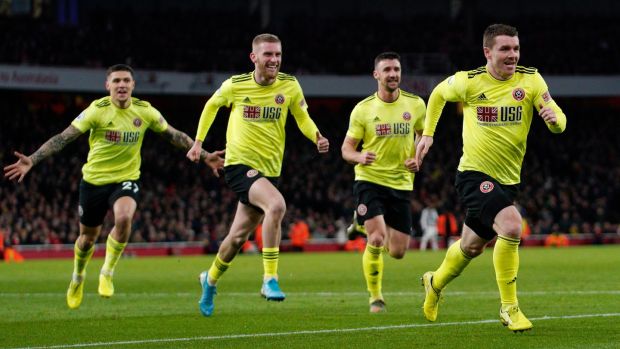 Sheffield United’s John Fleck celebrates after scoring against Arsenal. Photo: EPA