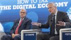 OECD secretary general Angel Gurría (left) and French finance minister Bruno Le Maire take part in a panel session during the 50th annual meeting of the World Economic Forum in Davos. Photograph: EPA