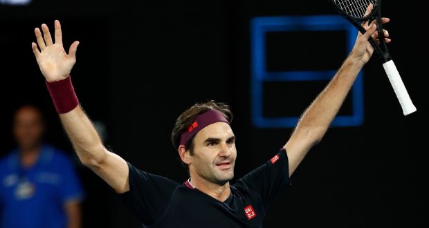 Roger Federer celebrates his five-set win over John Millman. Photograph: Darrian Traynor/Getty