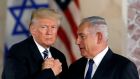 US president Donald Trump and Israeli prime minister Binyamin Netanyahu: deal appears timed to allow Mr Netanyahu steal back an  election agenda dominated by charges of bribery. Photograph: Ronen Zvulun