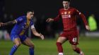  Curtis Jones of Liverpool and Oliver Norburn of Shrewsbury Town during their FA Cup Fourth Round tie  in Shrewsbury. Photograph: James Baylis/Getty Images