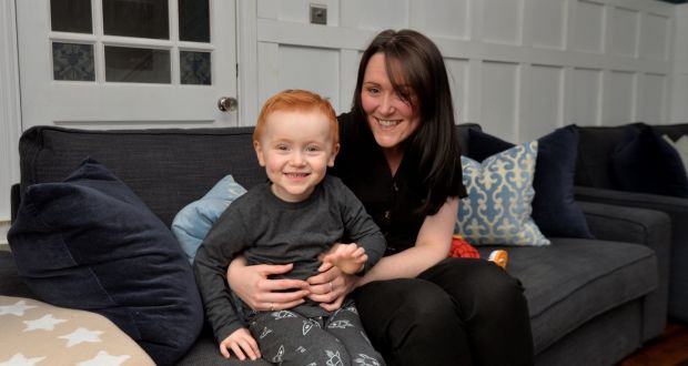  Martina Murphy with her two-year-old son Ethan in their home in Lusk. Martina cares for her mother since  her father passed away. Photograph: Alan Betson