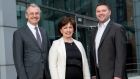 Kevin Holland, chief executive of Invest NI, economy minister Diane Dodds, and Darren Dillon of Microsoft at the announcement of its new cyber security centre in Belfast.