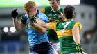 Dublin’s Conor McHugh is tackled by Kerry duo  Paul Murphy and Brian Ó Beaglaoich during the Division One league clash at Croke Park. Photograph: Bryan Keane/Inpho 